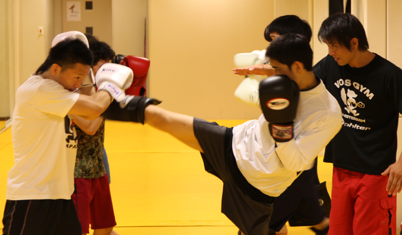 Tsuyoshi instructing kickboxing class