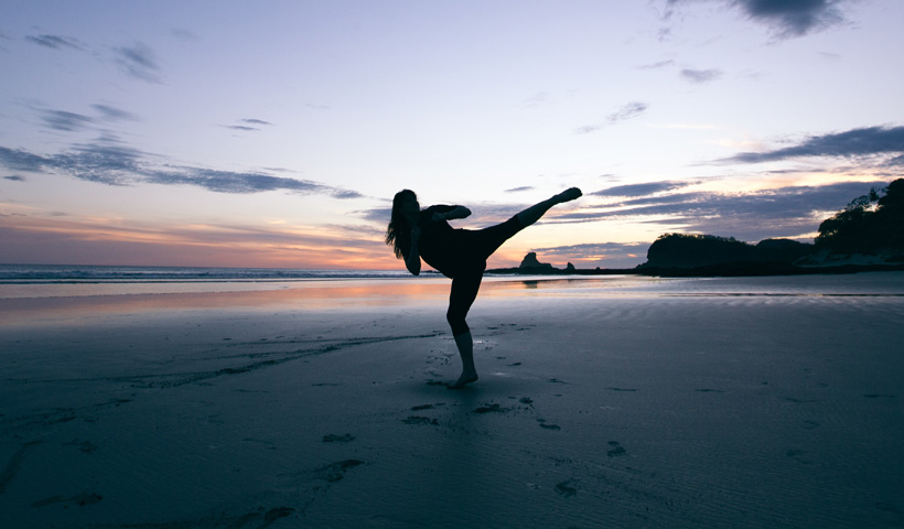 Kicking on the beach